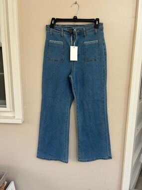 Mid-Rise Blue Flare Jeans with Front Patch Pockets